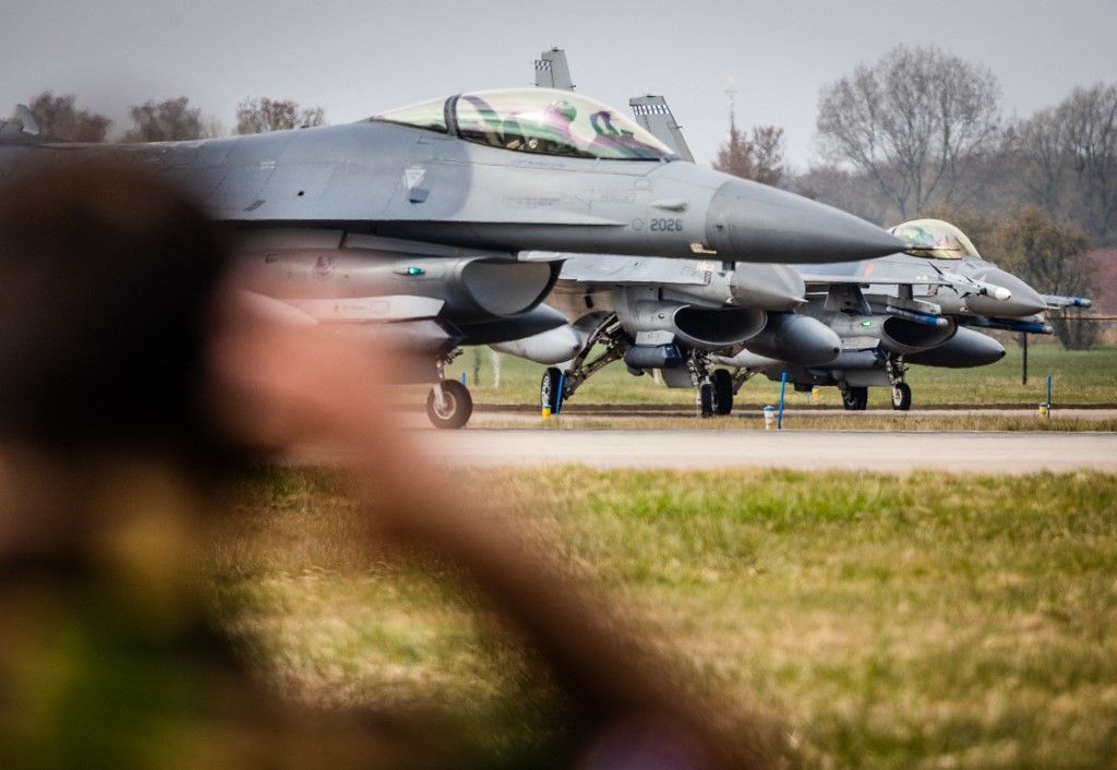 A picture shows F-16 fighter jets during the NATO international air force exercise Frisian Flag, at Leeuwarden Air Base on March 28, 2022. Some thirty aircrafts have taken off from Leeuwarden twice a day, mainly flying over the North Sea and the north of the country. Part of the flight was also flown in Danish airspace. (Photo by Jeffrey Groeneweg / ANP / AFP) / Netherlands OUT