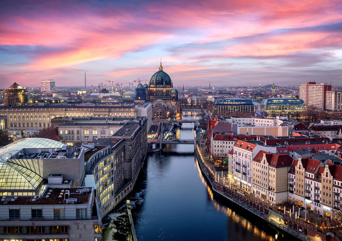Panoramic,View,Of,The,Skyline,Of,Berlin,,Germany,,With,The
Panoramic view of the skyline of Berlin, Germany, with the famous Berliner Dome, river Spree and the Nicolai district during sunset time