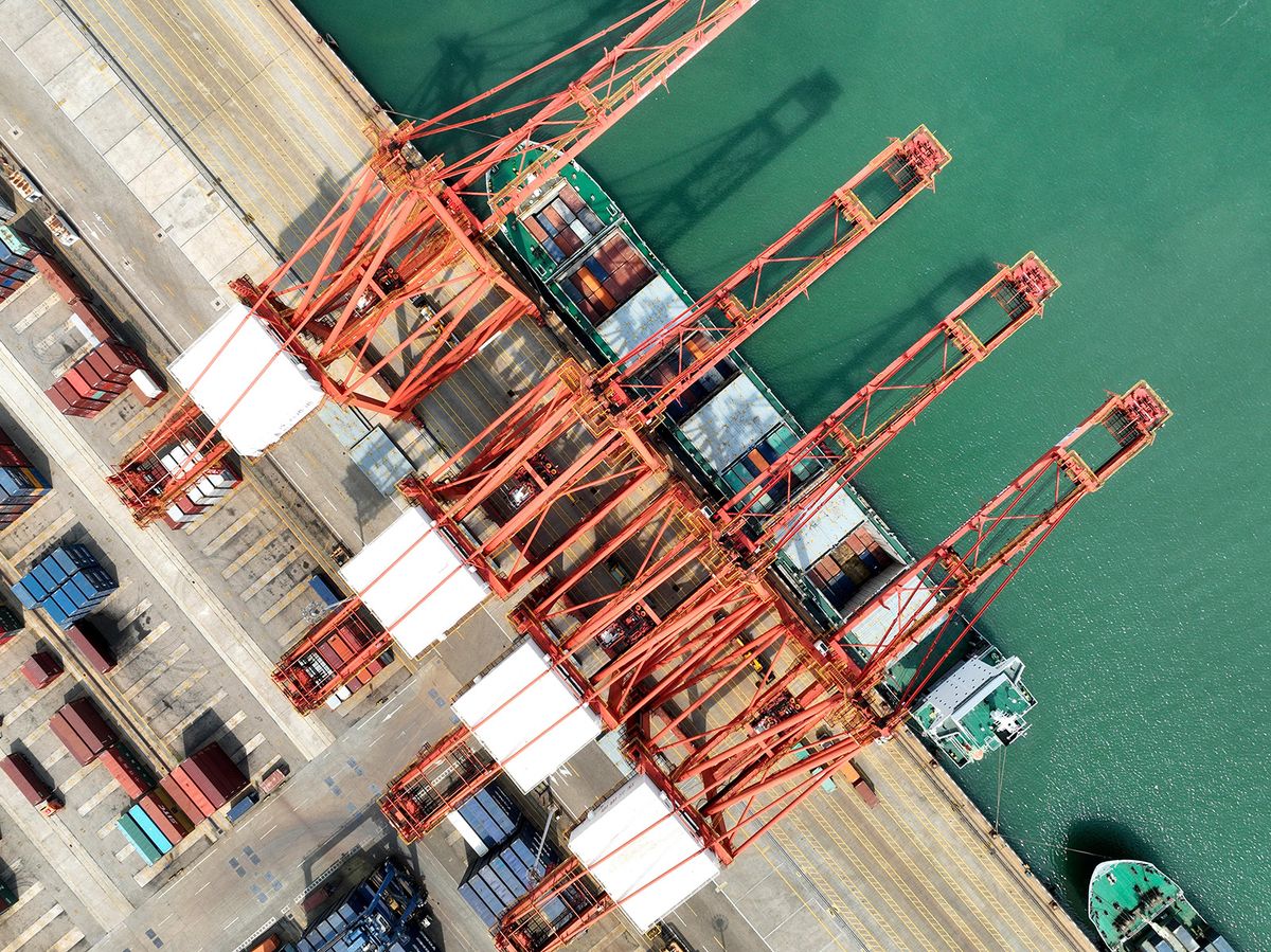 Aerial photo shows containers are loaded or unloaded at Lianyungang Port in Lianyungang City, east China's Jiangsu Province, 16 August, 2023. (Photo by stringer / ImagineChina / Imaginechina via AFP)