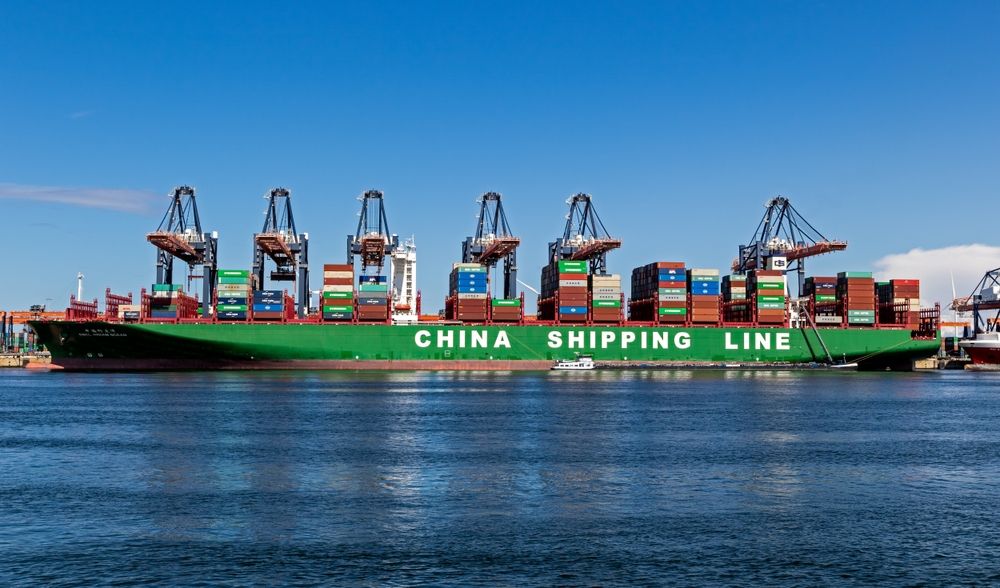 Container,Ship,From,China,Shipping,Line,Being,Loaded,By,Gantry