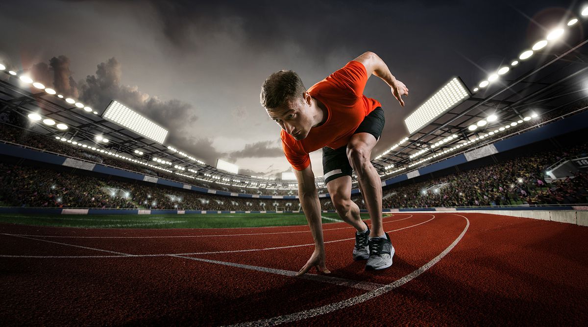 Sport,Backgrounds.,Sprinter,Starting,On,The,Sport,Arena.,Dramatic,Image.