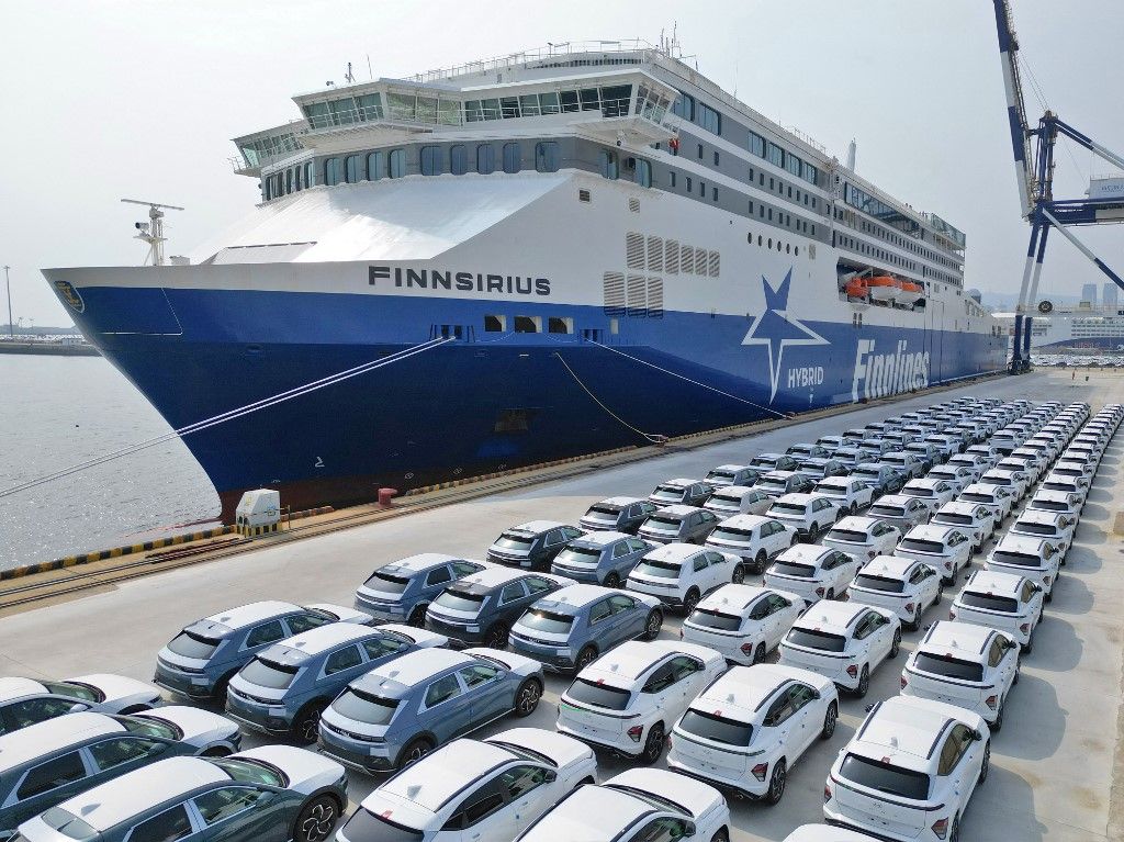 The Petrol-electric Hybrid High-end Passenger Roller ShipA petrol-electric hybrid high-end passenger roller ship ''Finnsirius'' loads commercial vehicles at Yantai Port in Yantai, Shandong Province, China, July 25, 2023. On July 25, 2023, the domestic oil-electric hybrid high-end passenger roller ship ''Finnsirius'' loaded 1029 commercial vehicles from Yantai Port to Europe and officially put into commercial operation. ''Finnsirius'' was built for Finland, 235 meters in length, 5,100 meters in lane length, can carry 1,212 passengers, including a high-capacity battery pack with a hybrid gasoline-electric system to significantly reduce emissions and achieve zero emissions at the terminal. (Photo by Costfoto/NurPhoto) (Photo by CFOTO / NurPhoto / NurPhoto via AFP)