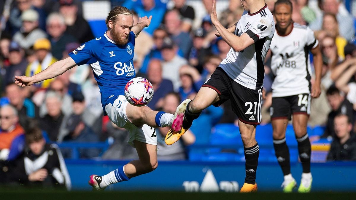 Everton FC v Fulham FC - Premier LeagueTom Davies #26 of Everton F.C tackled by Daniel James #21 of Fulham during the Premier League match between Everton and Fulham at Goodison Park, Liverpool on Saturday 15th April 2023. (Photo by Mike Morese/MI News/NurPhoto) (Photo by MI News / NurPhoto / NurPhoto via AFP)