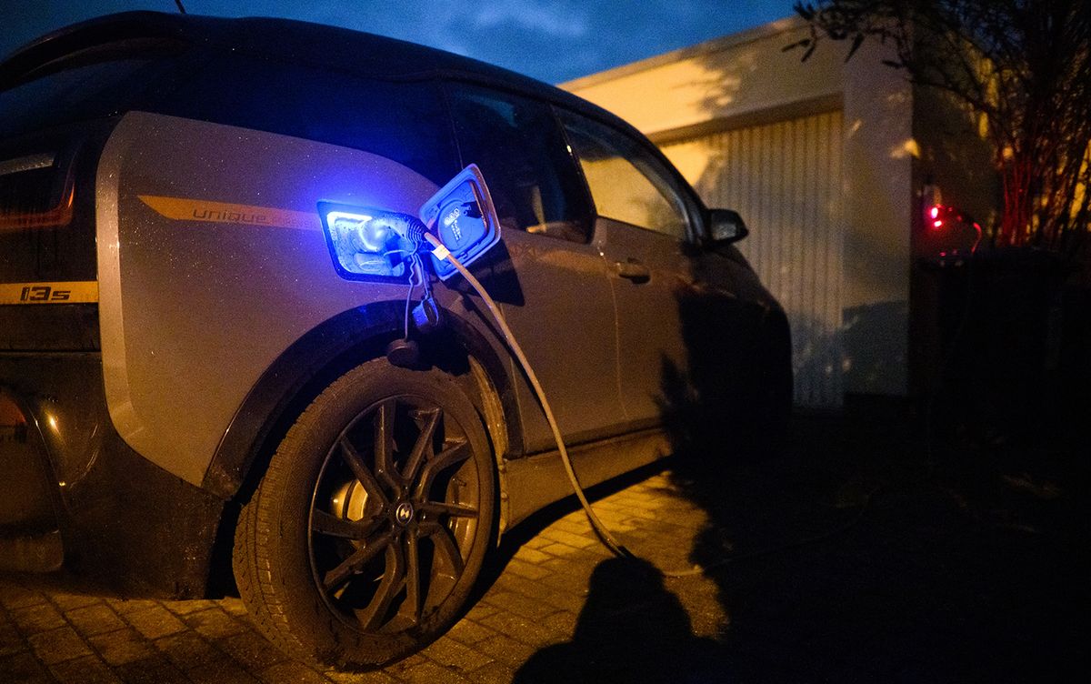 Home charger for electric car
PRODUCTION - 10 January 2023, Lower Saxony, Laatzen: A BWM i3s electric car is charged with a cable at a private wallbox at a single-family home in the Hannover region (posed scene). Photo: Julian Stratenschulte/dpa (Photo by JULIAN STRATENSCHULTE / DPA / dpa Picture-Alliance via AFP)