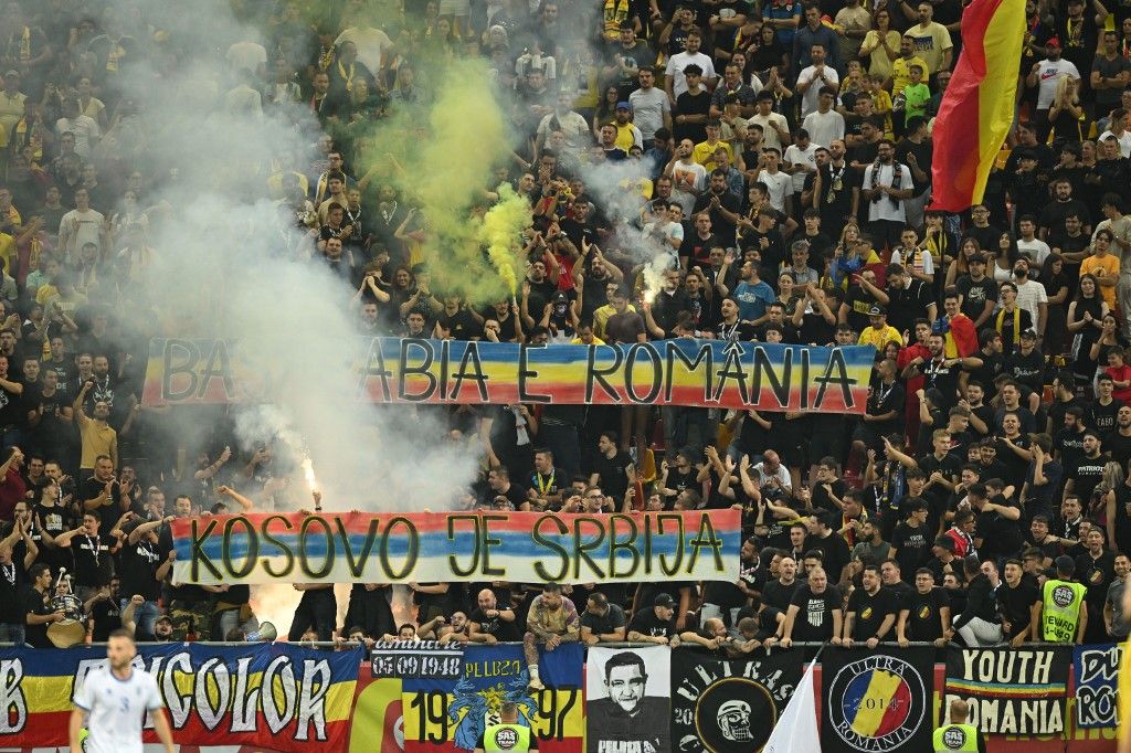 Football: Euro 2024, qualifying - 1st round day 6: Group I Romania v KosovoRomanian ultras display a banners reading (in Serbian) "Kosovo is Serbia" and (in Romanian) "Bessarabia is Romania" during the EURO 2024 first round group I qualifying football match between Romania and Kosovo in Bucharest on September 12, 2023. (Photo by Daniel MIHAILESCU / AFP)