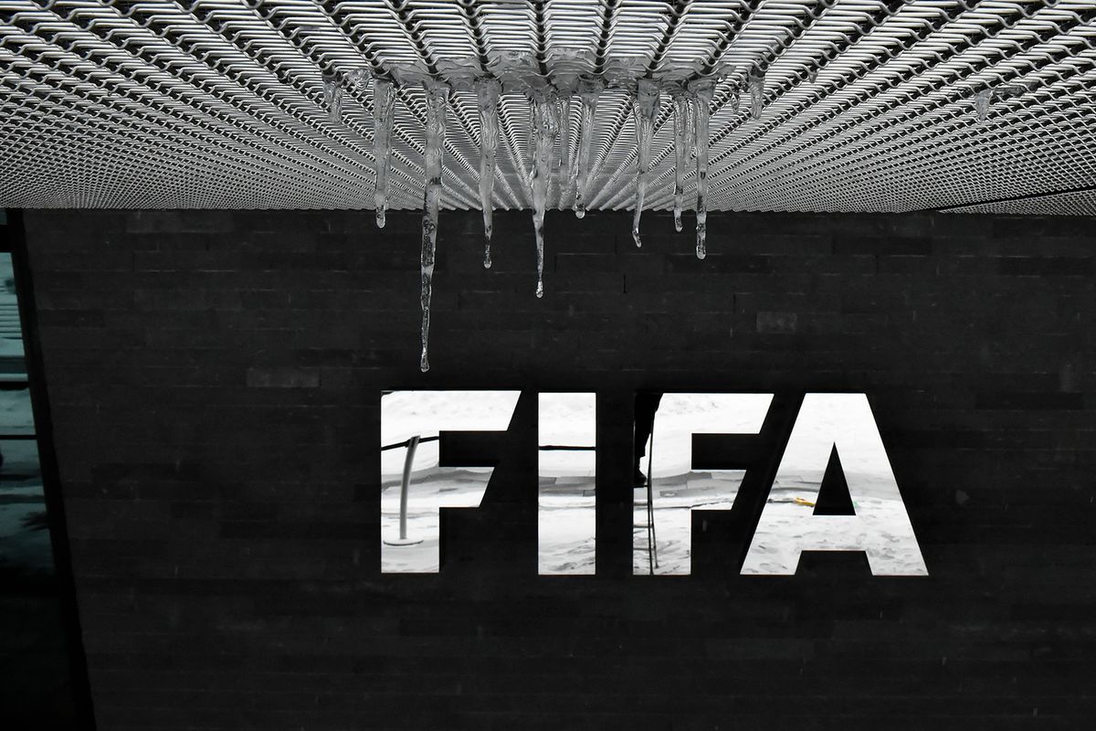 (FILES) The logo of the International Federation of Association Football (FIFA) with hanging icicles is pictured at the FIFA headquarters in Zurich, during meeting of the FIFA's governing council on January 10, 2017. Two convictions in the FIFA corruption case have been overturned by a US federal judge citing a recent Supreme Court ruling.Hernan Lopez, a former executive with 21st Century Fox and Argentine sports marketing firm Full Play were found guilty in March of paying bribes and kickbacks to South American football officials in various schemes related to television and marketing rights.But US district Judge Pamela Chen, in a ruling issued late on August 31, said a May Supreme Court decision, meant that the convictions for wire fraud could not stand. (Photo by Michael Buholzer / AFP)