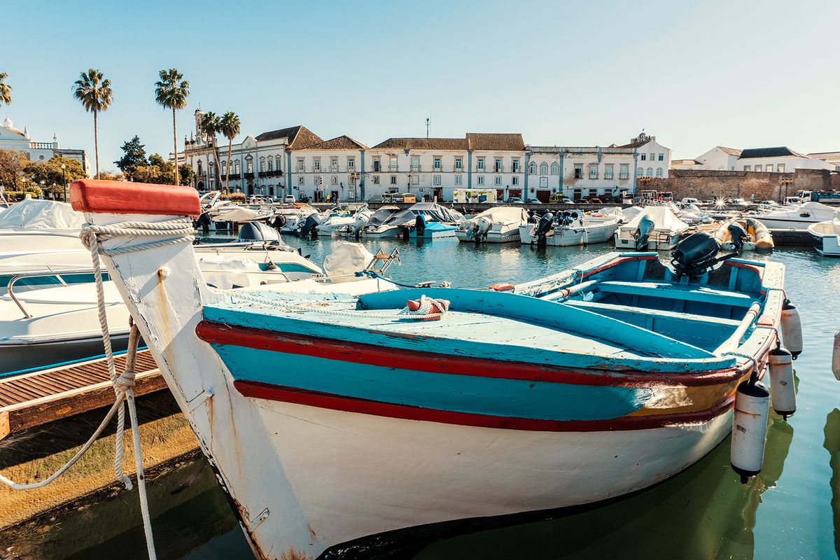 Old,Town,Of,Faro,With,Traditional,Wooden,Boat,Moored,In