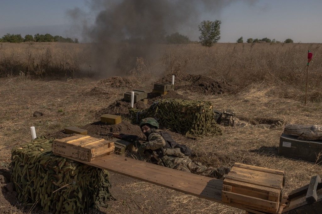 A Ukrainian member of the OPFOR (opposing force) battalion takes part in a military training in the Donetsk region on September 26, 2023, amid the Russian invasion of Ukraine. (Photo by Roman PILIPEY / AFP)