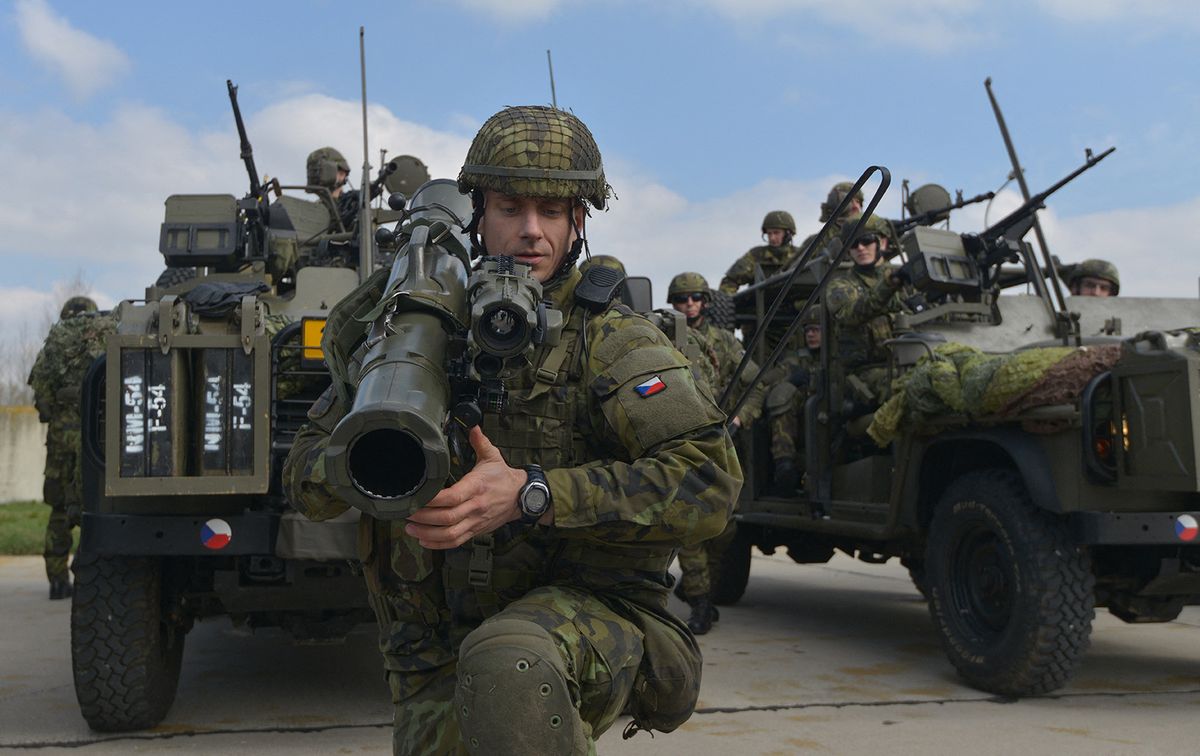 CZECH-ARMY-NATO-DRILL
Czech Republic's soldier from the 43rd airborne battalion holds a rocket launcher during the NATO drill "The Noble Jump" at the airport in Pardubice on April 9, 2015. NATO exercises testing its newly forged rapid reaction forces were underway Thursday in the Czech Republic and the Netherlands involving some 1,500 troops, an alliance official said. AFP PHOTO / MICHAL CIZEK (Photo by MICHAL CIZEK / AFP)