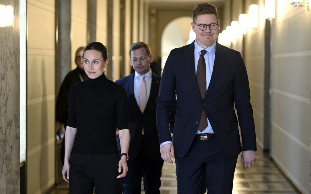 Social Democratic Party (SDP) chair and former PM Sanna Marin (L), SDP parliamentary group Antti Lindtman (R) and party secretary Antton Rönnholm (C) arrive to address the press in Helsinki, Finland, on April 24, 2023, after their meeting with National Coalition chair Orpo (not pictured). Petteri Orpo who has been mandated to form a new governing coalition has begun a series of meetings with Finnish parliamentary groups. He expects to announce which parties will enter actual government negotiations by the end of April. (Photo by Heikki Saukkomaa / Lehtikuva / AFP) / Finland OUT