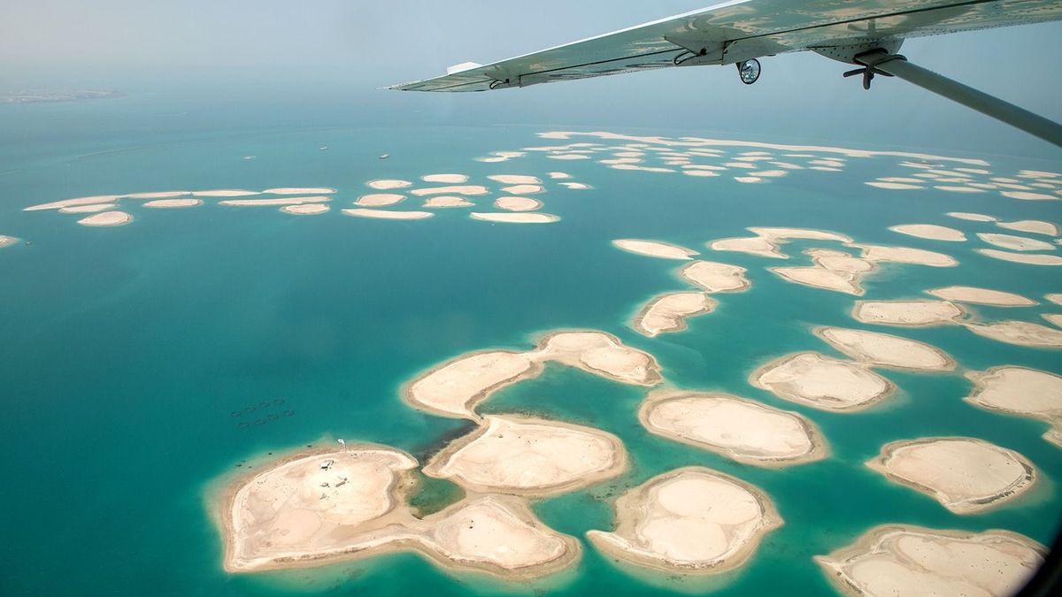Aerial view of The World Islands. Man made island. Dubai, UAE. 