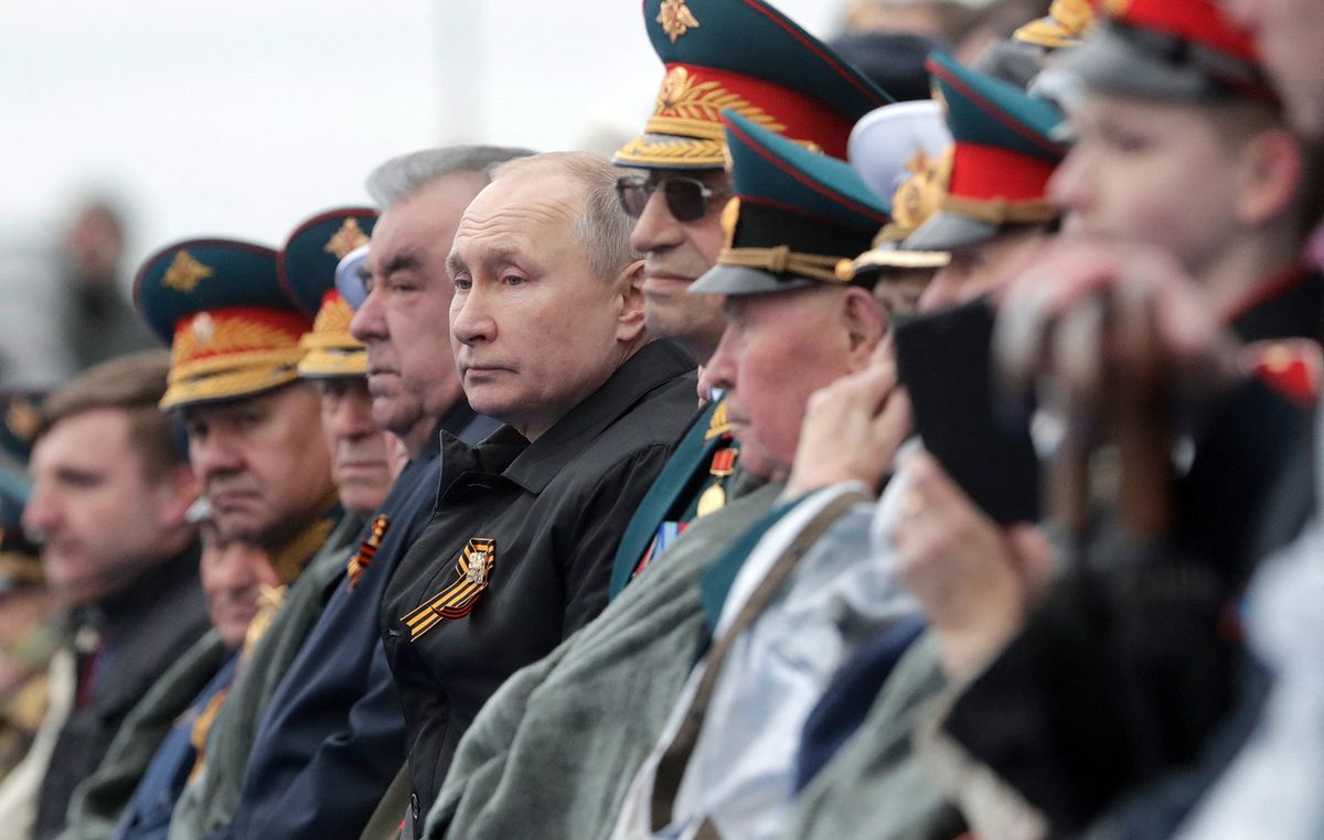 Russian President Vladimir Putin watches the Victory Day military parade at Red Square in Moscow on May 9, 2021. Russia celebrates the 76th anniversary of the victory over Nazi Germany during World War II. (Photo by SPUTNIK / AFP)
