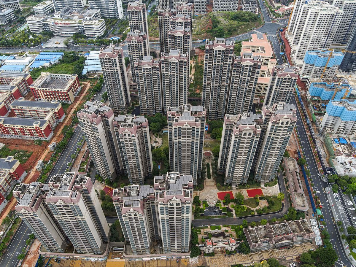 China Evergrande Debts 2,388.2 Billion Chinese Yuan
NANNING, CHINA - AUGUST 29, 2023 - Aerial photo taken on August 29, 2023, 2019 shows the Evergrande Yuelongtai residential complex in Longgang District, Nanning City, Guangxi Zhuang Autonomous region. China Evergrande announced in the evening of August 27 on the Hong Kong Stock Exchange that as of June 30, 2023, the group's total liabilities were 23,882.0 billion yuan, and as of June 30, 2023, China Evergrande Group had a land reserve of 190 million square meters. In addition, the group has participated in 78 old renovation projects, including 55 in the Greater Bay Area (34 in Shenzhen) and 23 in other cities. (Photo by Costfoto/NurPhoto) (Photo by CFOTO / NurPhoto / NurPhoto via AFP)