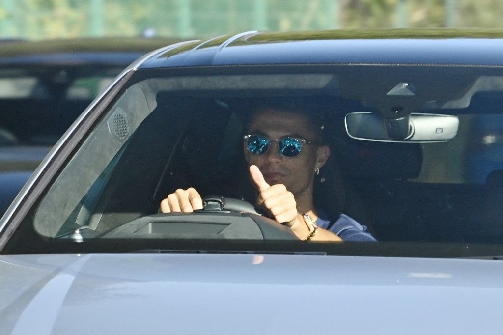 Manchester United's new signing Cristiano Ronaldo arrives to attend a training session at the Carrington training ground in greater Manchester, north west England on September 8, 2021. (Photo by Paul ELLIS / AFP)