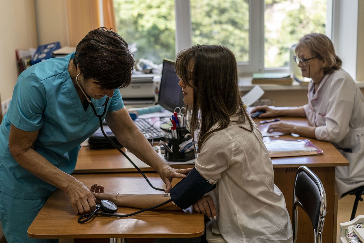 CNE 'Municipal Hospital No.2' in Kramatorsk
KRAMATORSK, UKRAINE - JULY 28: A nurse measures a patient's blood pressure at the CNE 'Municipal Hospital No.2' in Kramatorsk, Ukraine on July 28, 2023 amid Russia and Ukraine war. Since the beginning of the war, Kramatorsk hospitals have been operating uninterruptedly, providing quality medical care around the clock to anyone who needs it. Every hospital in Kramatorsk helps both civilians and soldiers to overcome the disease and return to normal life. Doctors are able to intervene in patients with the quality assistance and fast delivery provided by UNICEF and 'Medecins Sans Frontieres' to the 'City Hospital No. 2' and 'Healthy Future' foundation. Jose Colon / Anadolu Agency (Photo by JOSE COLON / ANADOLU AGENCY / Anadolu Agency via AFP)