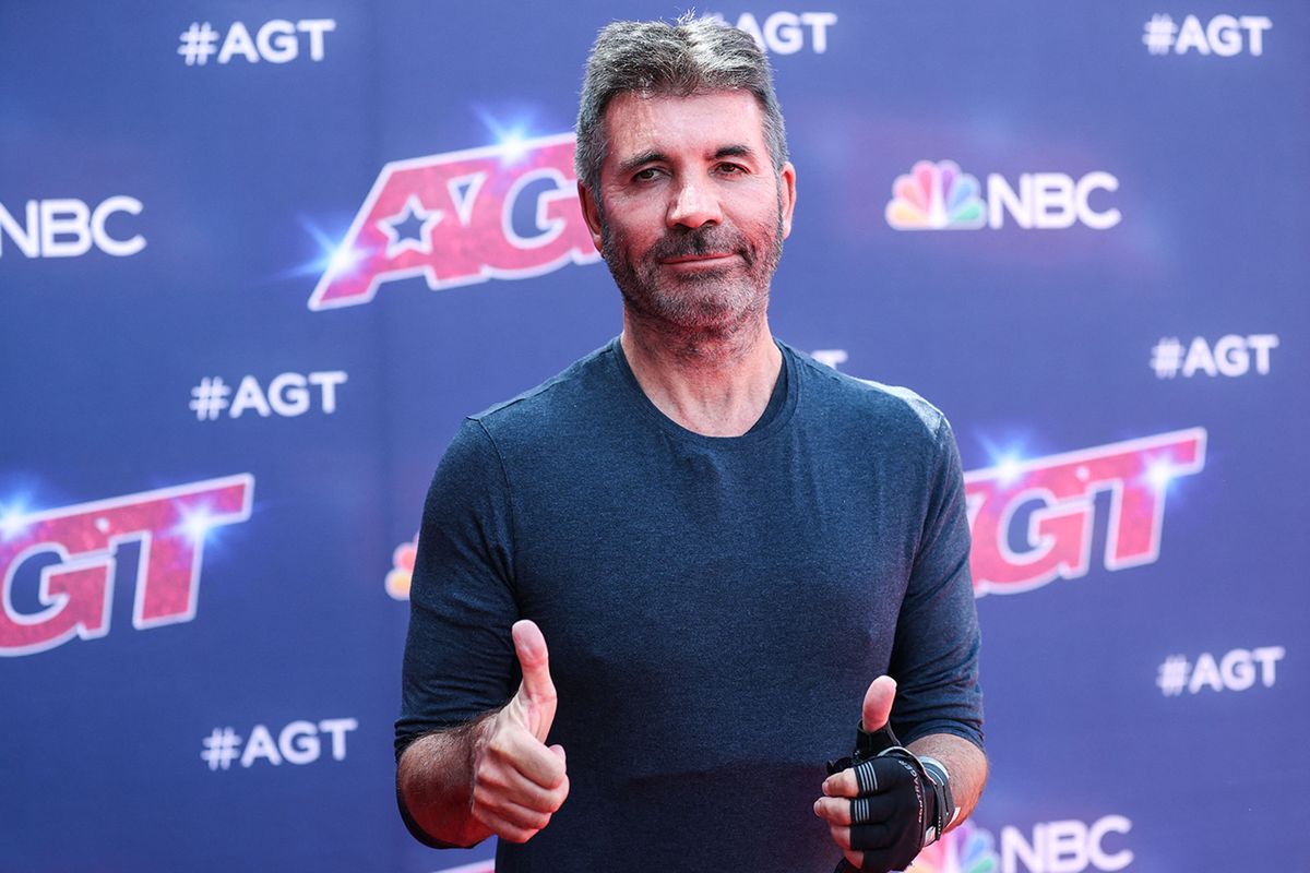 English TV personality Simon Cowell arrives at NBC's 'America's Got Talent' Season 17 Kick-Off Red Carpet held at the Pasadena Civic Auditorium on April 20, 2022 in Pasadena, Los Angeles, California, United States. (Photo by Xavier Collin/Image Press Agency/NurPhoto) (Photo by Image Press Agency / NurPhoto / NurPhoto via AFP)