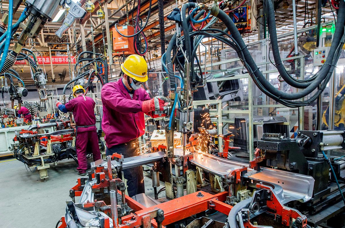 Factories busy producing after Spring Festival in east China
Workers put together parts in an automobile workshop in Weifang city, east China's Shandong province, 11 February 2020. (Photo by Wang Jilin / Imaginechina / Imaginechina via AFP)