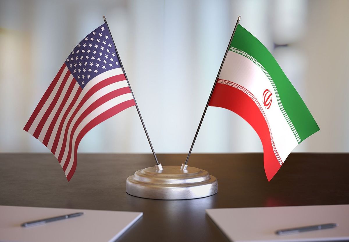 Usa,And,Iran,Flags,On,Table.,Negotiation,Between,Iran,And
USA and Iran flags on table. Negotiation between Iran and United states. 3D rendered illustration.