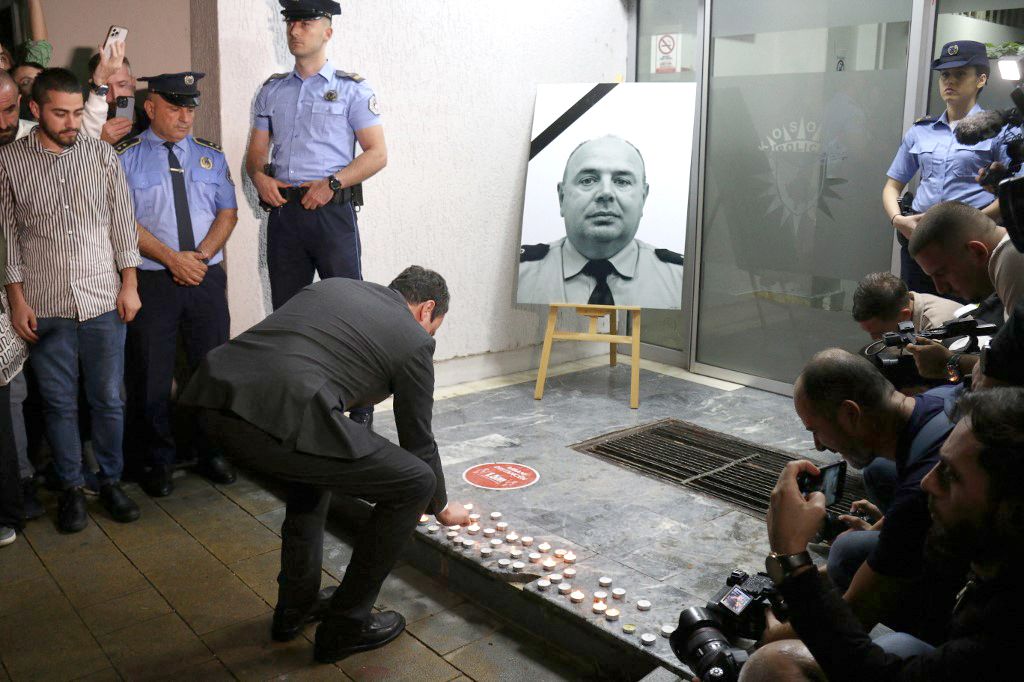 3 of armed individuals killed after attack on Kosovar police: Prime ministerPRISTINA, KOSOVO - SEPTEMBER 24: Kosovo's Prime Minister Albin Kurti leaves a candle in memory of the Kosovo Police officer Afrim Bunjaku, who was killed by armed gunmen in the village of Banjska near the border with Serbia, during a vigil in Pristina, Kosovo on September 24, 2023. Three of the armed ethnic Serbs who attacked police in northern Kosovo on Sunday morning have been killed and several others injured have been detained, Kosovar Prime Minister Albin Kurti said on Sunday. Erkin Keci / Anadolu Agency (Photo by Erkin Keci / ANADOLU AGENCY / Anadolu Agency via AFP)