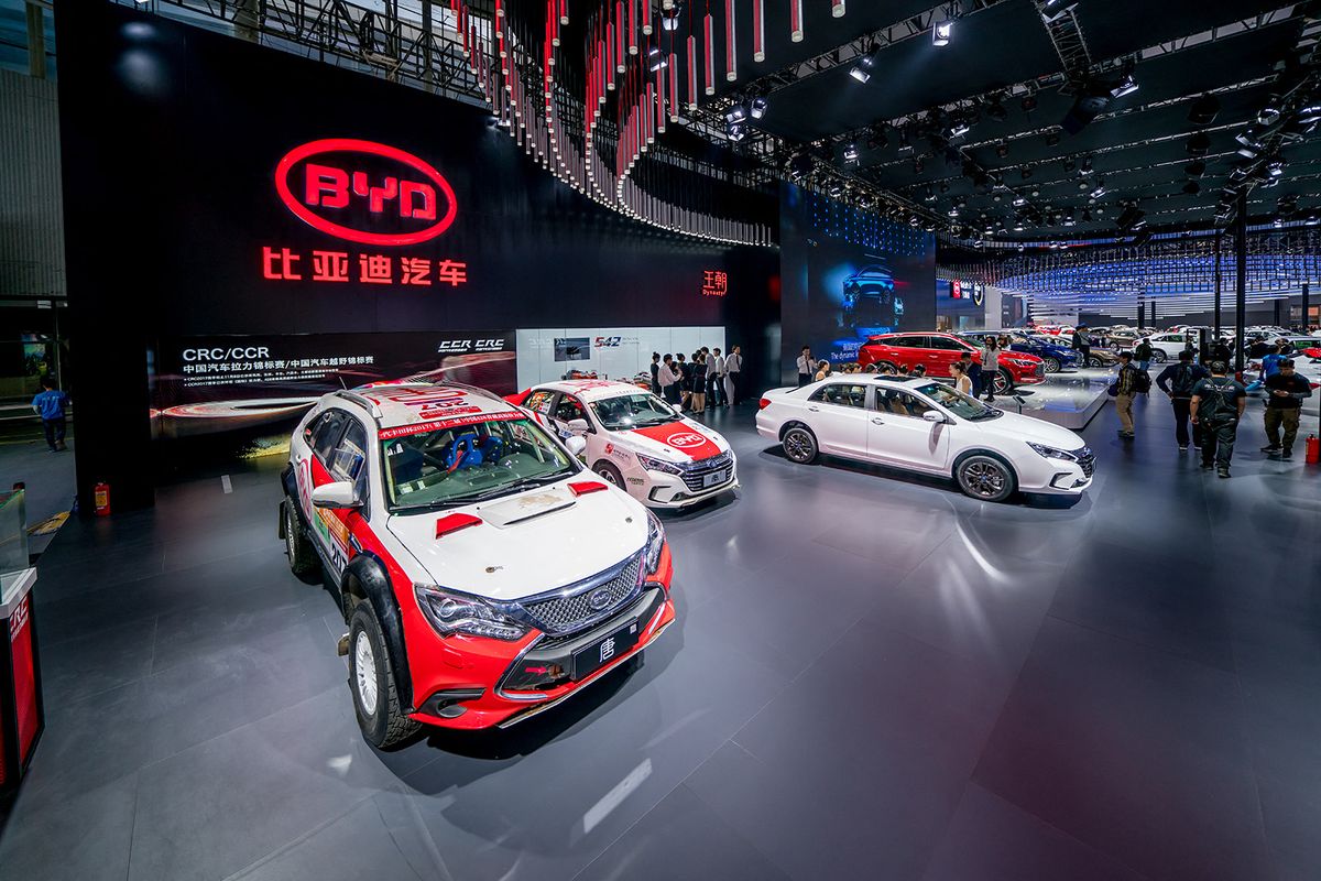 --FILE--People visit the stand of BYD during the 15th China (Guangzhou) International Automobile Exhibition, also known as Auto Guangzhou 2017, in Guangzhou city, south China's Guangdong province, 21 November 2017. Morocco and Chinese BYD electric vehicle maker signed on Saturday (9 December 2017) an agreement to open a factory in Morocco to build battery-powered cars, official MAP news agency reported. The agreement was inked in Casablanca by BYD Chairman Wang Chuanfu, Morocco's Minister for Industry and Investment Moulay Hafid El Alamy, and Financial Minister Mohamed Boussaid. The factory will be built in the new Mohamed VI Tangier Tech City, as part of a project between China and Morocco to create a large-scale industrial hub in the northern city of Tangier. The plant will cover an area of 50 hectares, and is expected to employ 2,500 people. Also on Saturday, King Mohammed VI of Morocco received Wang Chuanfu at Royal Palace in Casablanca. The king also chaired the presentation ceremony of BYD's electric transportation system project in Morocco, the report said. (Photo by Gan jun / Imaginechina / Imaginechina via AFP)