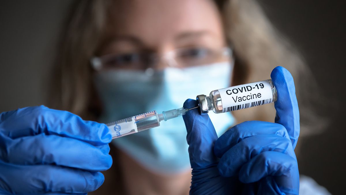 Covid-19,Vaccine,In,Researcher,Hands,,Female,Doctor's,Holds,Syringe,And
