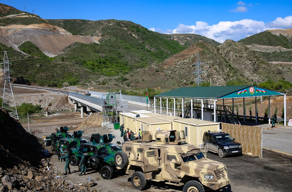 A view of an Azerbaijani checkpoint recently set up at the entry of the Lachin corridor, the Armenian-populated breakaway Nagorno-Karabakh region's only land link with Armenia, by a bridge across the Hakari river on May 2, 2023. Armenia and Azerbaijan have fought two wars over the mountainous enclave of Karabakh that left tens of thousands dead. Moscow brokered a ceasefire after the latest bout of fighting in 2020 and posted peacekeepers along the Lachin corridor. (Photo by Tofik BABAYEV / AFP)