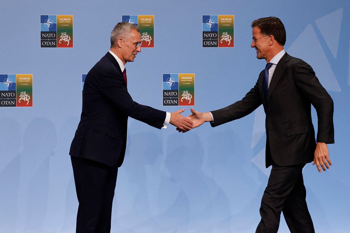 Netherlands' Prime Minister Mark Rutte (R) greets NATO Secretary General Jens Stoltenberg during the NATO summit, in Vilnius on July 11, 2023. NATO leaders will grapple with Ukraine's membership ambitions at their summit on July 11, 2023, their determination to face down Russia boosted by a breakthrough in Sweden's bid to join the alliance. (Photo by Ludovic MARIN / POOL / AFP) / SOLELY FOR SIPA