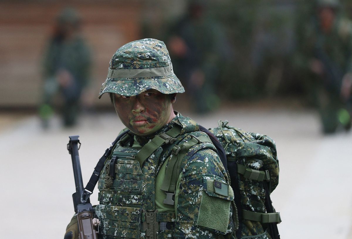 A participant attends a military training conducted by a private company, Yunlin National Defense Education Association, in Yunlin Taiwan on March 19, 2023. ( The Yomiuri Shimbun ) (Photo by Koki Kataoka / Yomiuri / The Yomiuri Shimbun via AFP)