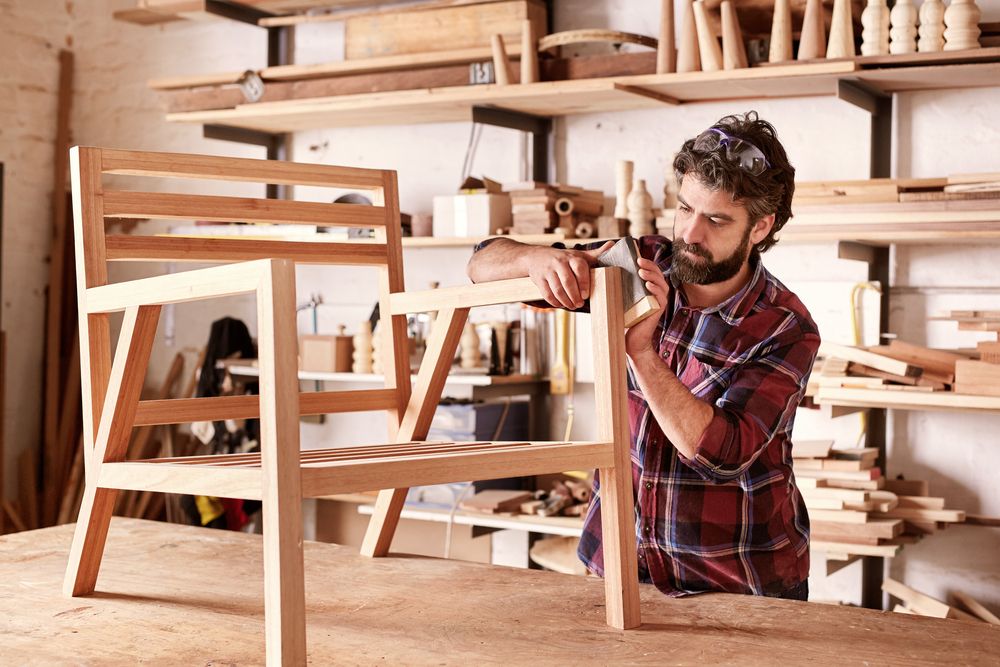 Serious,Furniture,Designer,Carefully,Sanding,A,Chair,Frame,That,He