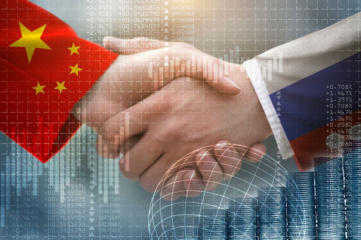 Two,Businessman,Shake,Hands,,China,And,Russia,,Partnership,Concepttwo businessman shake hands, china and russia, partnership concept