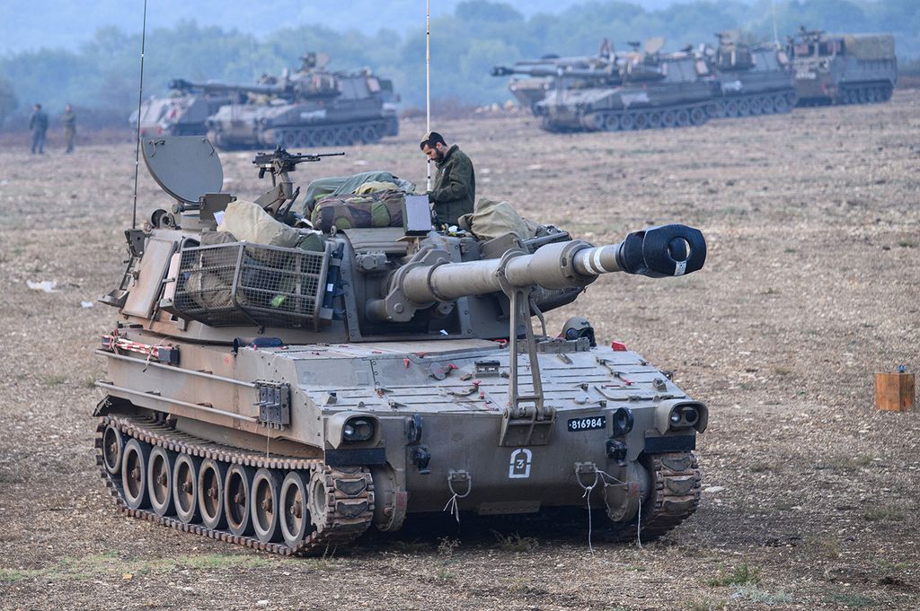 ISRAEL-BORDER-LEBANON-CONFLICT(231008) -- JERUSALEM, Oct. 8, 2023 (Xinhua) -- This photo taken on Oct. 8, 2023 shows Israeli military vehicles in northern Israel near the border with Lebanon.  Dozens of rockets and heavy artillery shells were fired toward Israeli positions on the Shebaa Farms, a disputed strip of land at the intersection of the Lebanese-Syrian border and the Israeli-annexed Golan Heights, early Sunday morning, Lebanese army intelligence sources confirmed to Xinhua.  In response, the Israeli military fired artillery into the Lebanese area from which the attack originated, an army spokesperson said in a statement. Later, a drone attack was launched, targeting tents set up by Hezbollah in the region, according to the spokesperson. (Ayal Margolin/JINI via Xinhua)Xinhua News Agency / eyevineContact eyevine for more information about using this image:T: +44 (0) 20 8709 8709E: info@eyevine.comhttp://www.eyevine.com