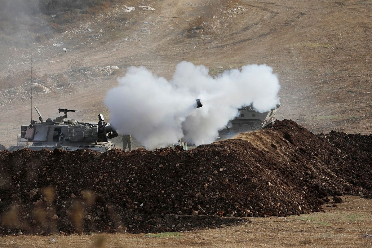 Israeli forces launch artillery fire towards southern Lebanon from the border zone in northern Israel on October 9, 2023, as Hezbollah denied involvement in  clashes or "any infiltration attempt" into Israel. The Israeli army said on October 9 its soldiers had "killed a number of armed suspects" who had crossed the border from Lebanon and that Israeli helicopters were striking targets in the area. (Photo by Jalaa MAREY / AFP)