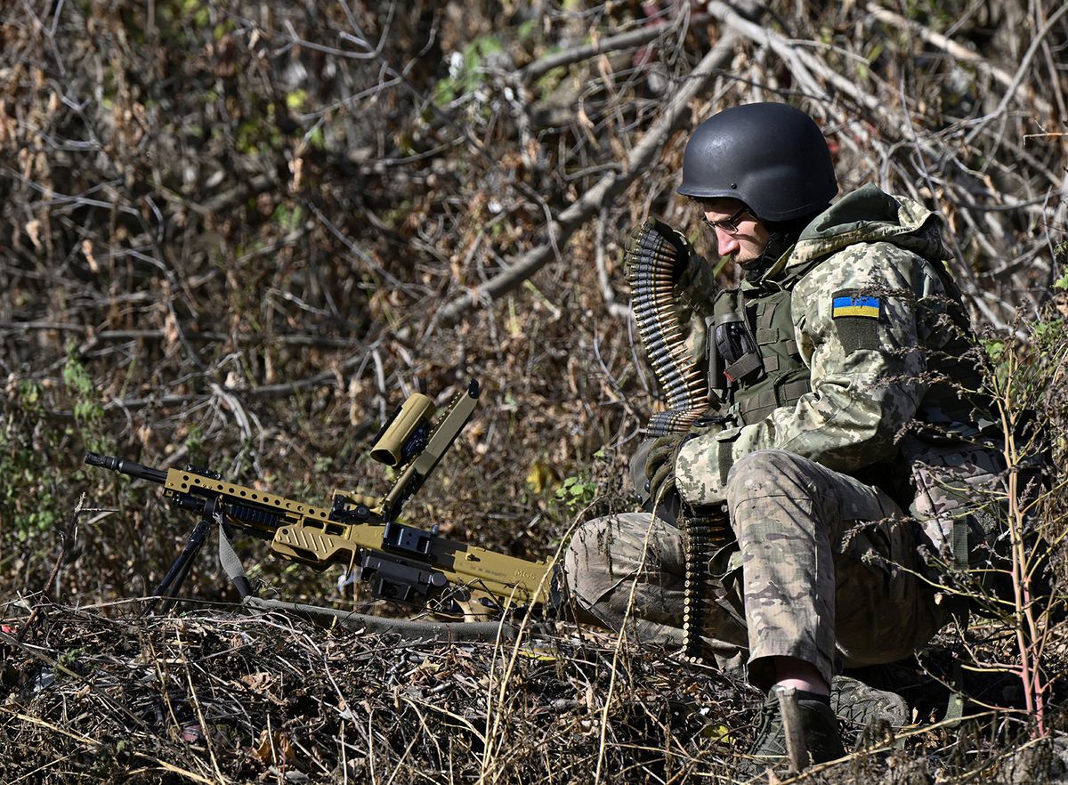 A member of a newly-formed "Siberian Battalion" within the Ukrainian Armed Forces takes part in a military training exercise outside Kyiv on October 24, 2023, amid the Russian invasion of Ukraine. A newly formed "Siberian Battalion" as part of the International Legion within the Ukrainian Armed Forces is made up of Russians who have come to fight against their fellow citizens. They were a varied group-both ethnic Russians with long-standing opposition views and members of minority ethnic groups. (Photo by Genya SAVILOV / AFP)