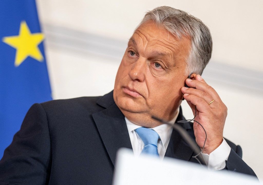 Hungarian Prime Minister Viktor Orban listens to questions during a press conference after the Migration Summit in Vienna on July 7, 2023. (Photo by GEORG HOCHMUTH / APA / AFP) / Austria OUT