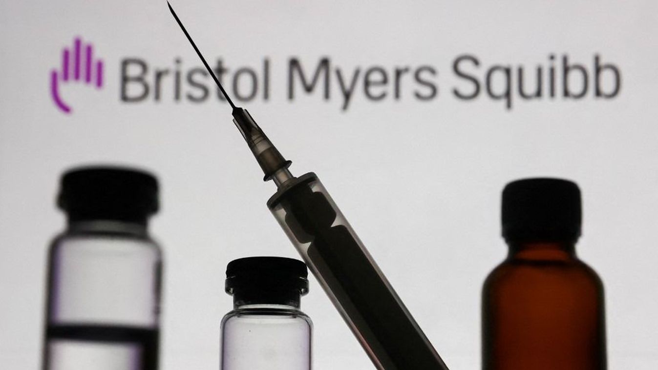 Pharmaceutical Companies Photo IllustrationsMedical bottles and syringe are seen with Bristol Myers Squibb logo displayed on a screen in the background in this illustration photo taken in Krakow, Poland on November 10, 2022. (Photo by Jakub Porzycki/NurPhoto) (Photo by Jakub Porzycki / NurPhoto / NurPhoto via AFP)