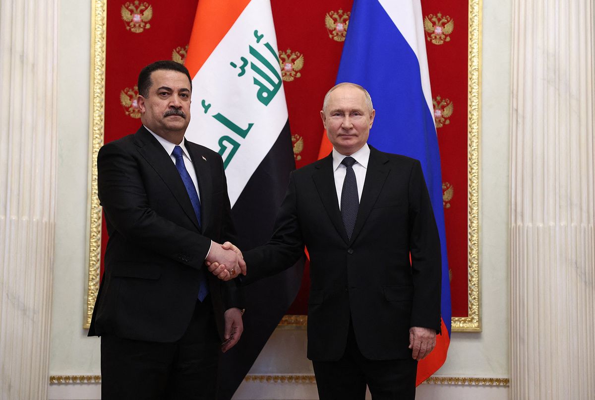 This pool photograph distributed by Russian state owned agency Sputnik shows Russian President Vladimir Putin meeting with Iraqi Prime Minister Mohamed Shia al-Sudani at the Kremlin in Moscow on October 10, 2023. (Photo by Sergei BOBYLYOV / POOL / AFP)