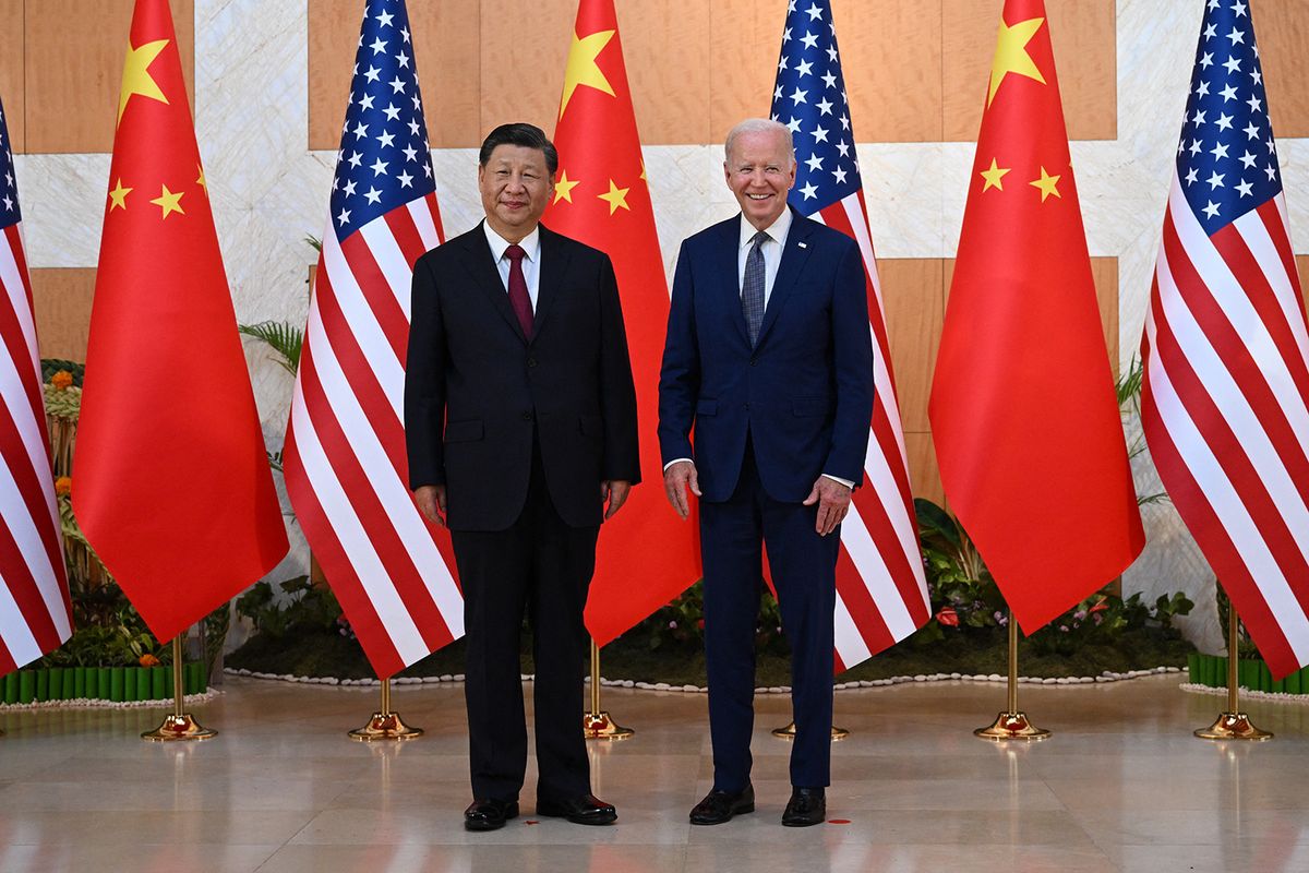 (FILES) US President Joe Biden (R) and China's President Xi Jinping (L) meet on the sidelines of the G20 Summit in Nusa Dua on the Indonesian resort island of Bali on November 14, 2022. China's top diplomat will pay a rare visit to Washington this week, the United States announced October 23, 2023, paving the way for a potential visit by President Xi Jinping aimed at keeping tensions in check. Foreign Minister Wang Yi, the highest-ranking Chinese official in the US capital in nearly five years, will visit from October 26 through October 28 against a backdrop of friction over trade, Ukraine, the Middle East, Taiwan and China's assertive actions at sea near the Philippines. (Photo by SAUL LOEB / AFP)