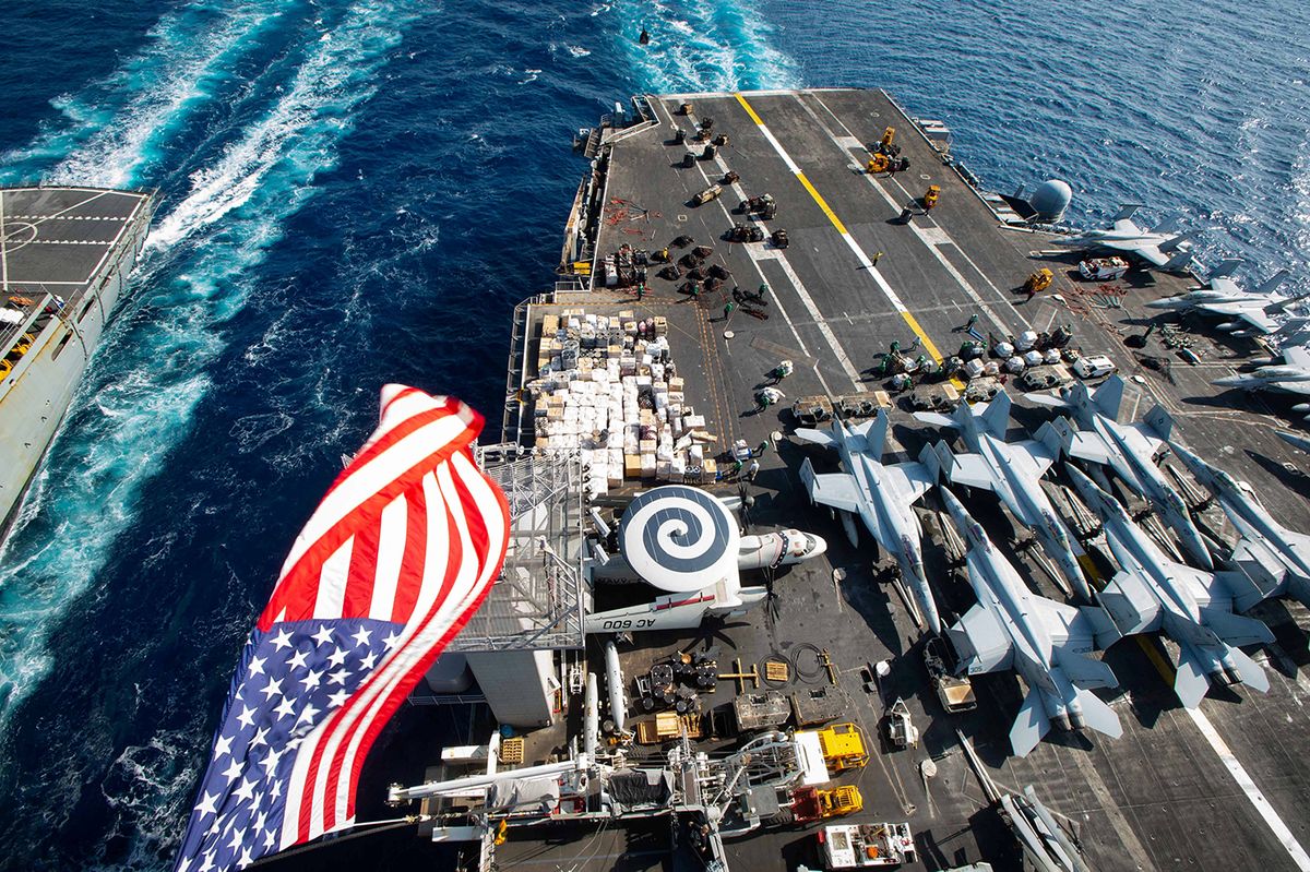 U.S. Navy Best Photos In 2021USS Dwight D. Eisenhower (CVN 69) replenishes from USNS Arctic (T-AOE 8) in the Arabian Sea, April 13, 2021.

See SWNS story SWBRnavy.

These are highlights of the stunning photographs captured by the U.S. Navy in 2021. The service has chosen its ‘2021: The Year in Photos’, with scenes ranging from the application of Covid vaccine to troops to a Top Gun-style sunset over an aircraft carrier. The service explains: ““The U.S. Navy entered 2021 with a lot on its plate. Forward presence, the Navy’s primary stock in trade for nearly two and a half centuries, remained in high demand. As they have for more than a century, military photographers and today's Mass Communication Specialists were there to document the work of American Sailors as they carried out their missions around the world, above, on and below the sea. The following photographs illustrate the integrity, accountability, initiative, and toughness of the Navy’s diverse, all-volunteer force of American Sailors and civilians following in the footsteps of those who, for 246 years, have gone before them in defense of freedom. Dedicated to all who made the ultimate sacrifice in defense of our Nation in 2021.” ***EXCLUSIVE***USS Dwight D. Eisenhower (CVN 69) replenishes from USNS Arctic (T-AOE 8) in the Arabian Sea, April 13, 2021.See SWNS story SWBRnavy.These are highlights of the stunning photographs captured by the U.S. Navy in 2021. The service has chosen its ‘2021: The Year in Photos’, with scenes ranging from the application of Covid vaccine to troops to a Top Gun-style sunset over an aircraft carrier. The service explains: ““The U.S. Navy entered 2021 with a lot on its plate. Forward presence, the Navy’s primary stock in trade for nearly two and a half centuries, remained in high demand. As they have for more than a century, military photographers and today's Mass Communication Specialists were there to document the work of American Sailors as they carried out their missions around the world, above, on and below the sea. The following photographs illustrate the integrity, accountability, initiative, and toughness of the Navy’s diverse, all-volunteer force of American Sailors and civilians following in the footsteps of those who, for 246 years, have gone before them in defense of freedom. Dedicated to all who made the ultimate sacrifice in defense of our Nation in 2021.” ***EXCLUSIVE***