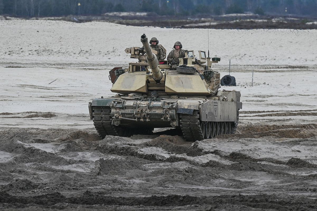 NOWA DEBA, POLAND - APRIL 12, 2023:US soldiers from 2nd Battalion, 70th Armor Regiment, 1st Infantry Division train with M1A2 Abrams tanks at Nowa Deba, in Nowa Deba, Poland, on April 12 2023.US and Polish soldiers team up at Nowa Deba to bolster NATO's eastern flank, backed by Poland's acquisition of 250 M1A2 Abrams tanks from the US Army. (Photo by Artur Widak/NurPhoto) (Photo by Artur Widak / NurPhoto / NurPhoto via AFP)