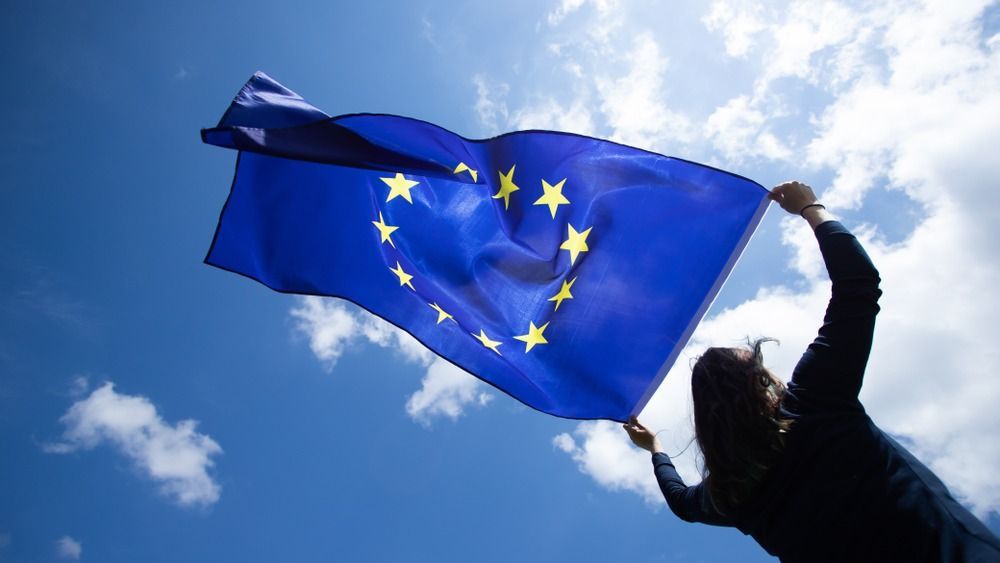 Young,Woman,Holding,European,Union,Flag.,Voting,,Election,Concept.