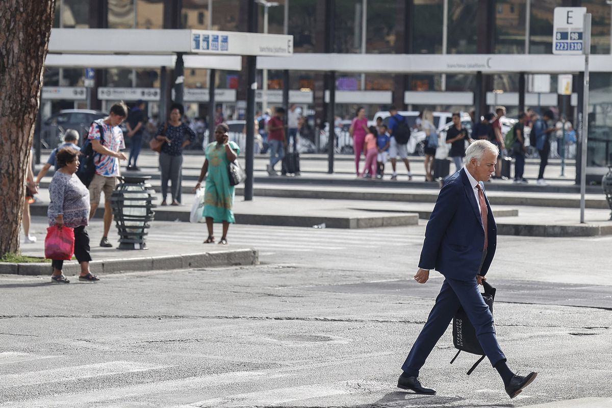 ROME, ITALY, SEPTEMBER 18: A man walks at a bus terminal in front of central Termini railway station in Rome, Italy, on September 18, 2023. Italy's local transportation services were hit by a nationwide strike proclaimed by several unions which led to a road traffic, long waiting times at the bus stops and several underground stations inaccessible to use. Riccardo De Luca / Anadolu Agency (Photo by RICCARDO DE LUCA / ANADOLU AGENCY / Anadolu via AFP)