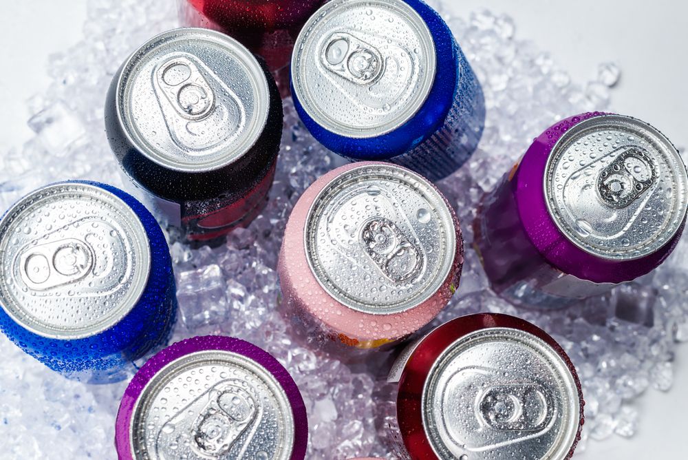 Group,Of,Aluminium,Cans,In,Ice,,Cold,Drink.,Top,View.