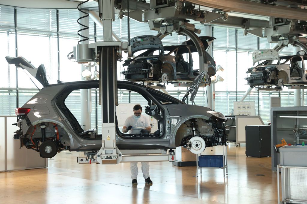 Volkswagen ID.3 Electric Car Production In DresdenDRESDEN, GERMANY - JUNE 08: A worker assembles the interior of a Volkswagen ID.3 electric car on the assembly line at the "Gläserne Manufaktur" ("Glass Manufactory") production facility on June 08, 2021 in Dresden, Germany. The Dresden plant is currently churning out 35 ID.3 cars per day. The ID.3 and ID.4 cars are also produced at VW's Zwickau plat located in the same region.  (Photo by Sean Gallup/Getty Images)