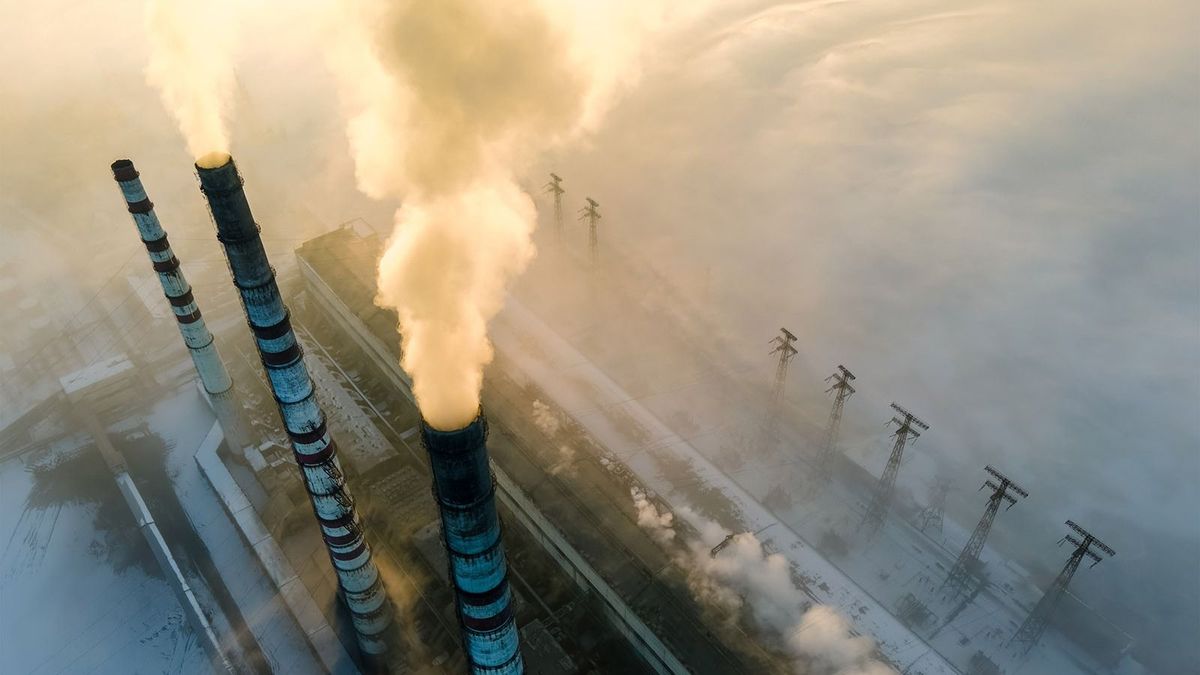 Aerial,View,Of,Coal,Power,Plant,High,Pipes,With,Black