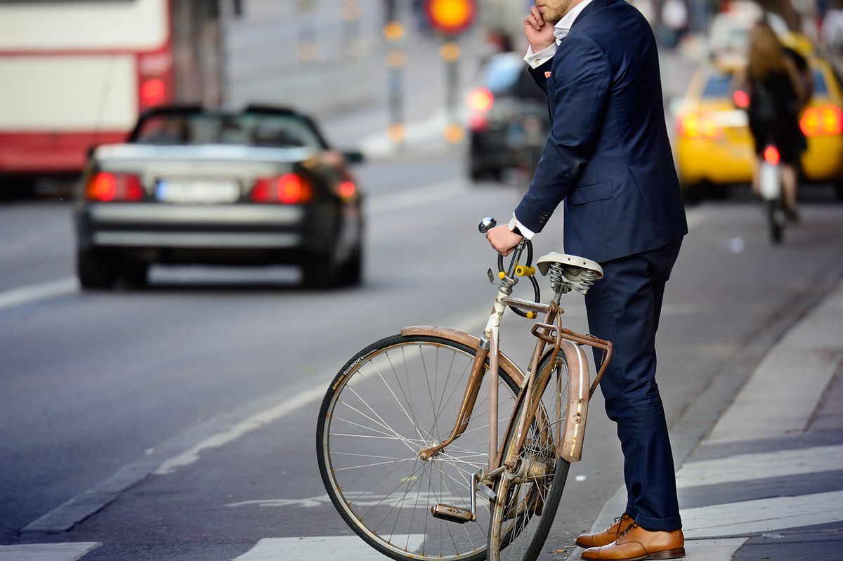 Man,In,Perfect,Suit,And,Old,Bike,,Typical,Stockholm,Scene