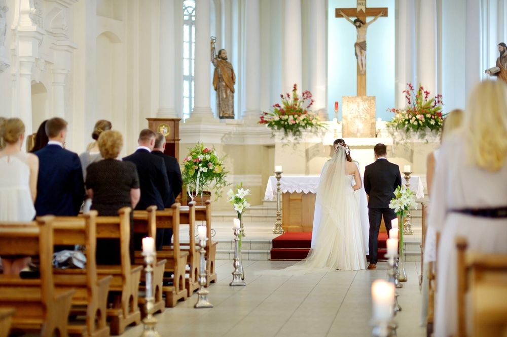 Bride,And,Groom,At,The,Church,During,A,Wedding,Ceremony