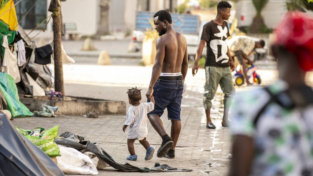 African irregular migrants in TunisiaTUNIS, TUNISIA - AUGUST 25: African migrants walk at street in Tunis, Tunisia on August 25, 2023. African migrants who arrived in Tunisia illegally take shelter at a street 200 meters from the International Organization for Migration (IOM) building. Yassine Gaidi / Anadolu Agency (Photo by Yassine Gaidi / ANADOLU AGENCY / Anadolu Agency via AFP)