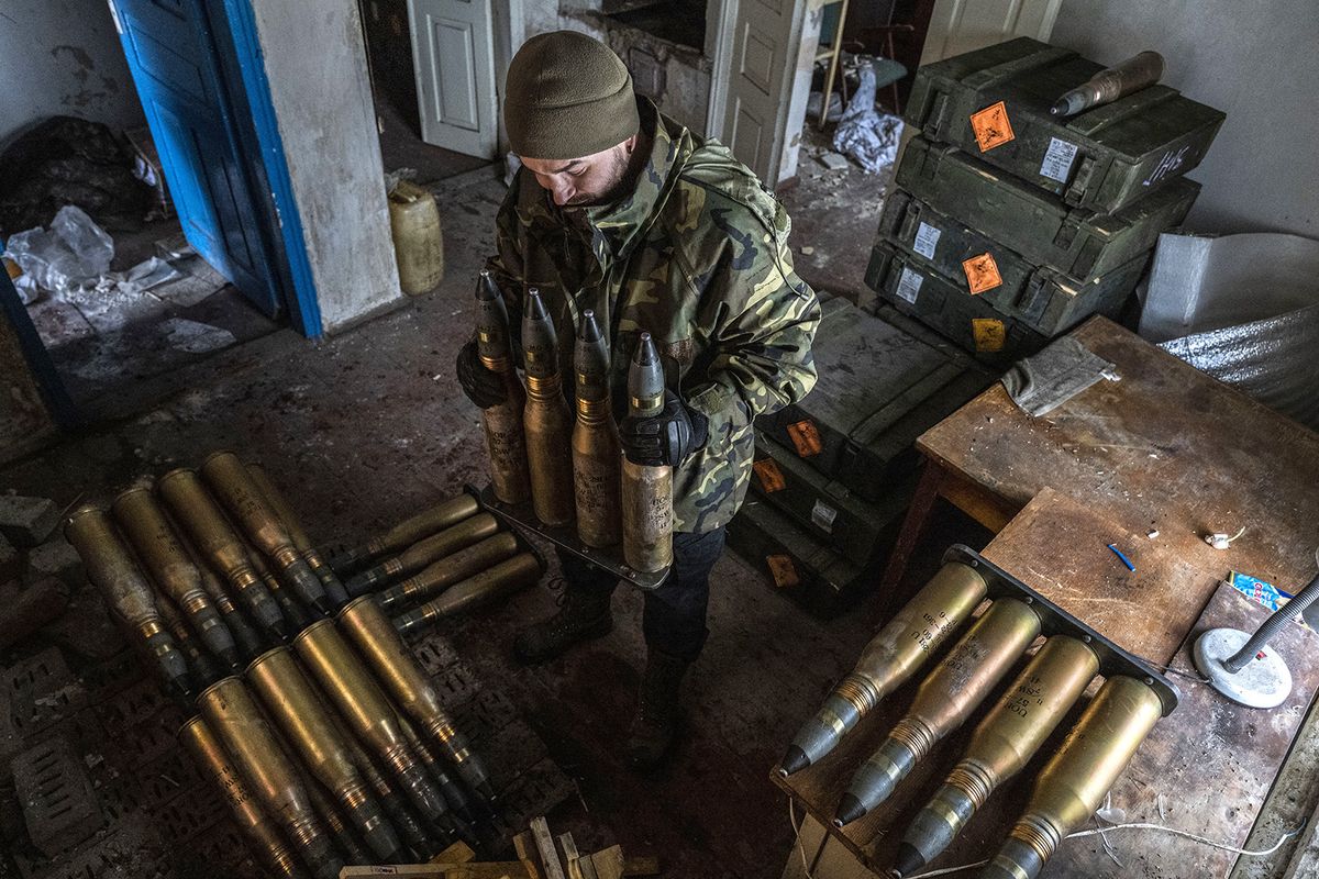 Military mobility continues in Bakhmut frontlineBAKHMUT, UKRAINE - A Ukrainian soldier holds artillery ammunition near the frontline area amid the Russia-Ukraine war, in Bakhmut, Ukraine .uhammed Enes Yildirim / Anadolu Agency (Photo by Muhammed Enes Yildirim / ANADOLU AGENCY / Anadolu Agency via AFP)