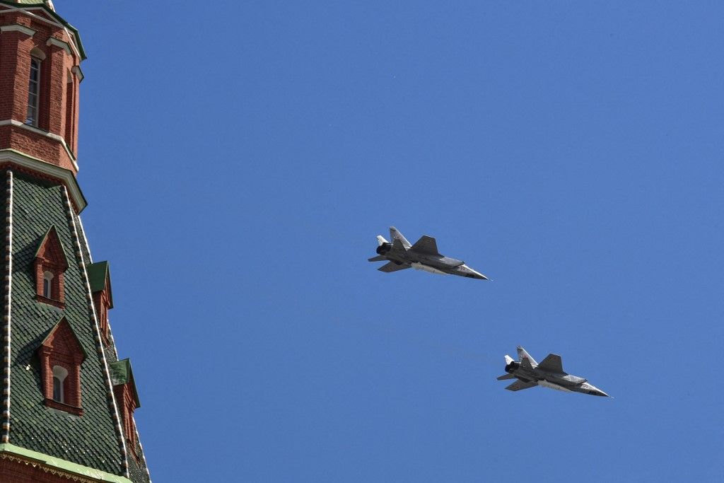 Russia's MiG-31 supersonic interceptor jets carrying hypersonic Kinzhal (Dagger) missiles fly over Red Square during the Victory Day military parade in Moscow on May 9, 2018. Russia marks the 73rd anniversary of the Soviet Union's victory over Nazi Germany in World War Two. (Photo by Yuri KADOBNOV / AFP)