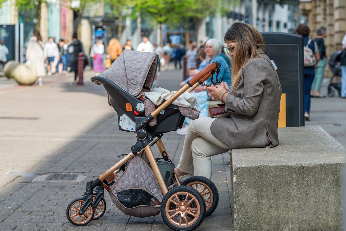 26.03.2022,-,Young,Mother,With,Pram